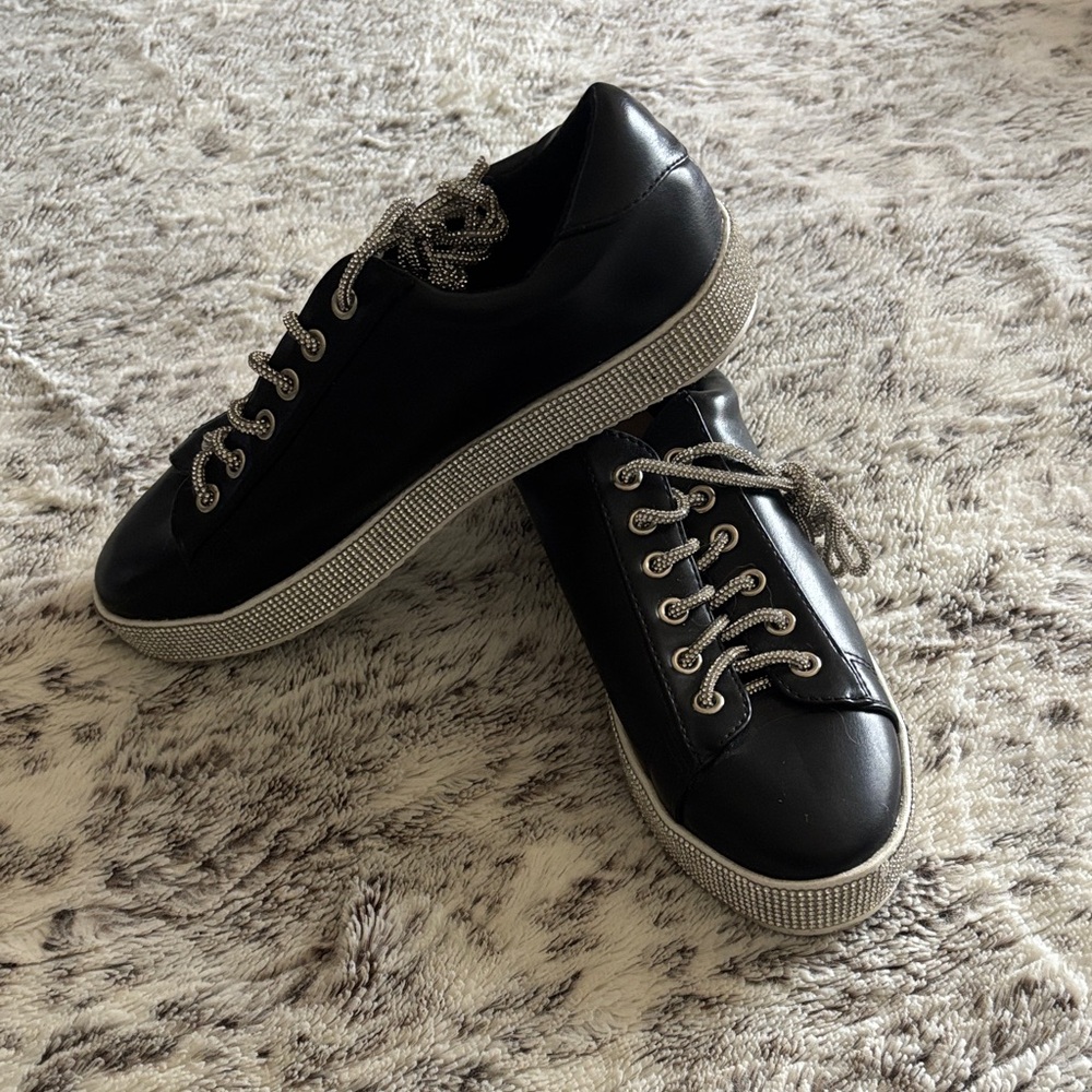Sleek Black Sneakers with Silver Accents